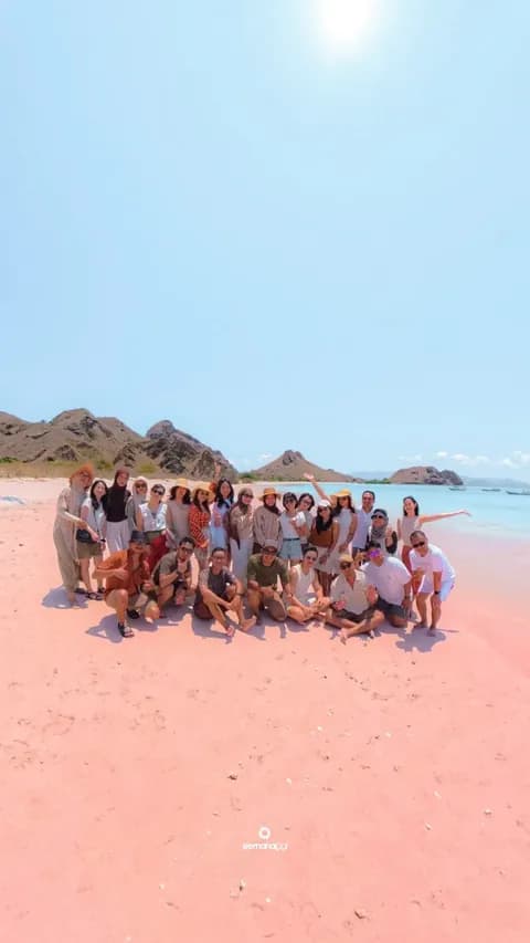 Group tour photo on Pink Beach, Komodo National Park